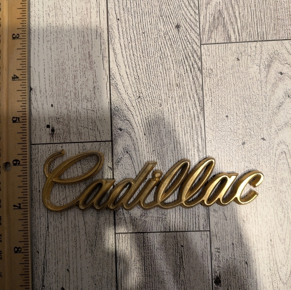 Cadillac Gold Emblem